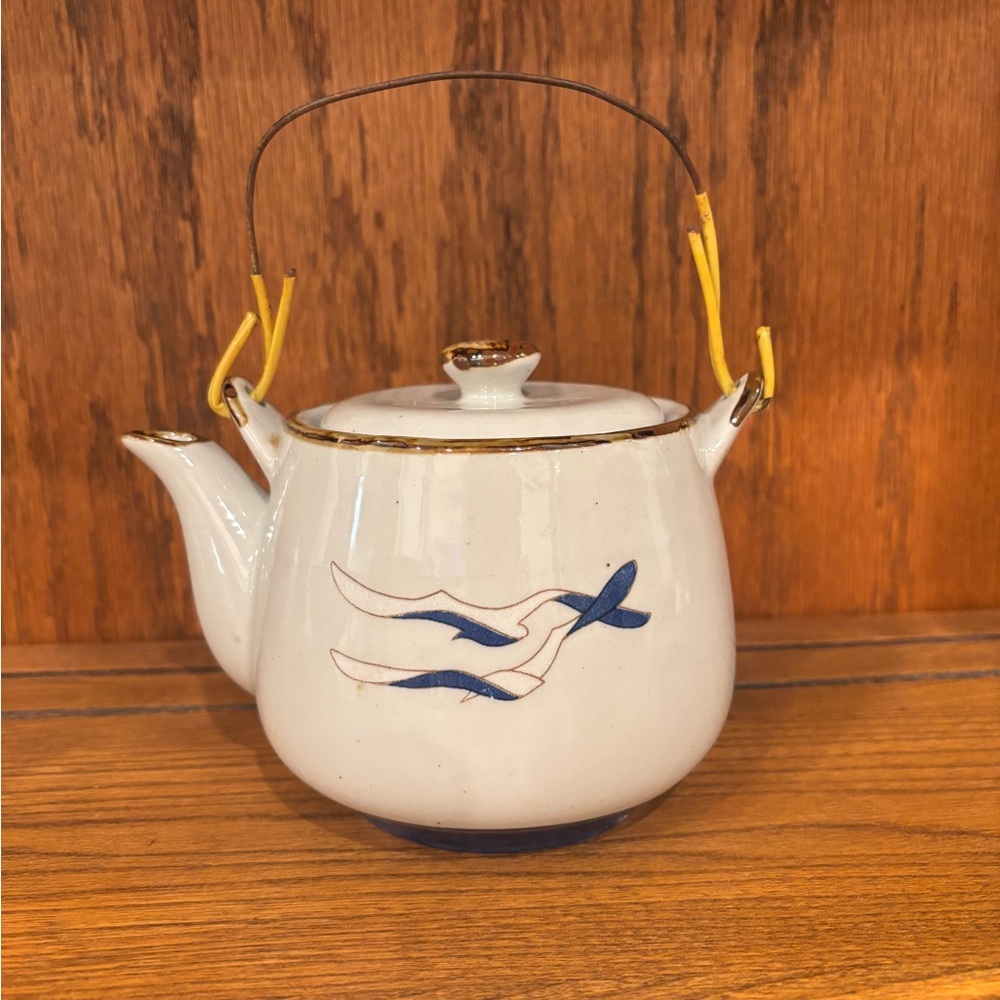 White Teapot with Blue Bird Design